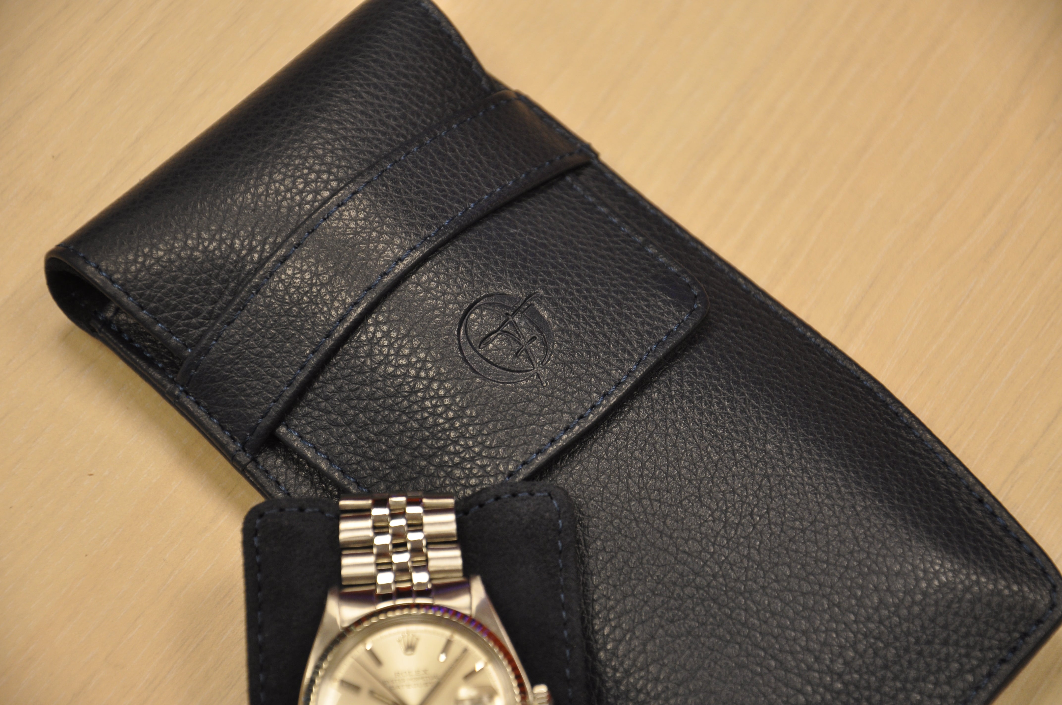 alt="OFL leather watch pouch for secure and stylish protection"