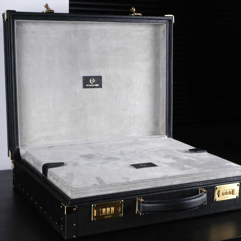OFL black leather watch case for 10–15 watches, open, showing grey suede interior