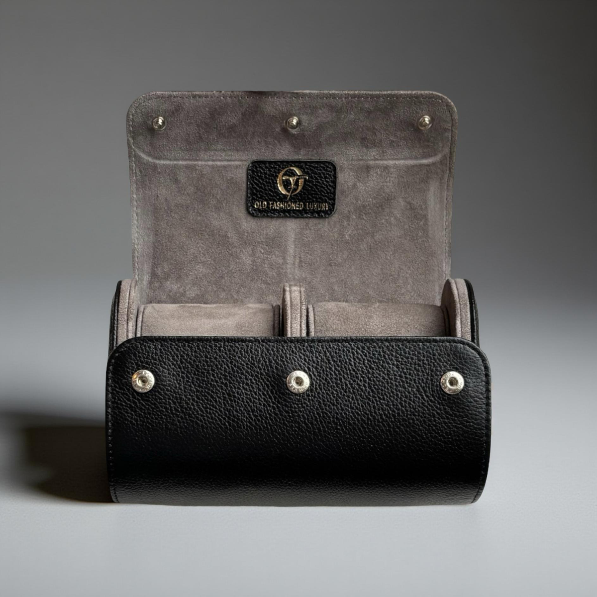 OFL handcrafted black leather watch roll for two watches, open with empty suede-lined compartments