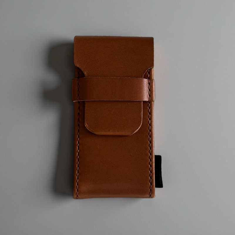 Cliff's handcrafted cognac bridle leather watch pouch, closed, front view